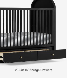 Black crib with two built-in storage drawers on a white background
