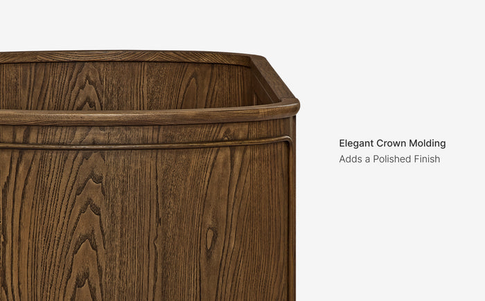 Wooden cabinet with elegant crown molding on a white background