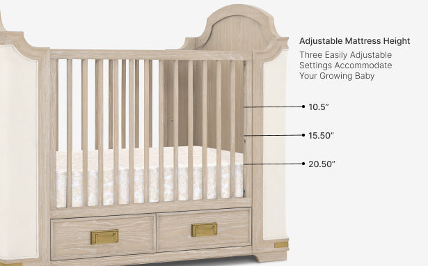 Beige crib with adjustable mattress height settings on a white background