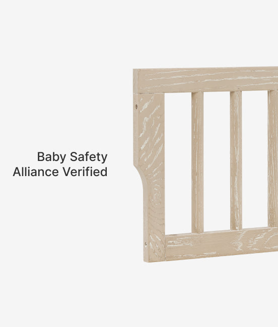 Wooden crib with 'Baby Safety Alliance Verified' text on a white background