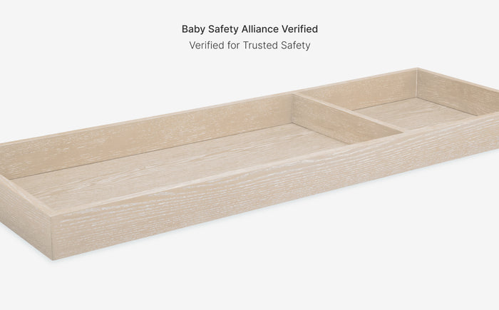 Wooden baby safety shelf with 'Baby Safety Alliance Verified' text on a white background