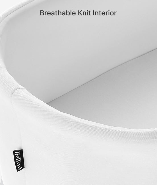 Close-up of a white pillow with breathable knit interior and 'Bellini' brand label.