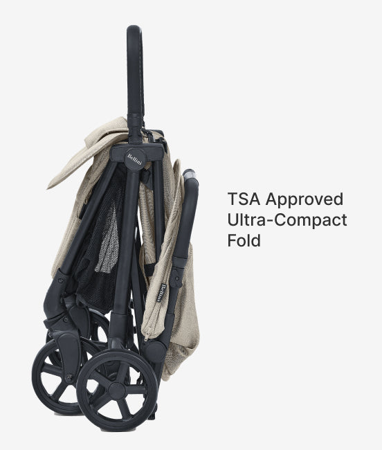 Compact folded stroller with text 'TSA Approved Ultra-Compact Fold' on a white background