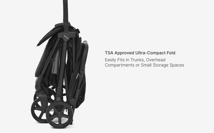 Compact black suitcase with wheels on a white background