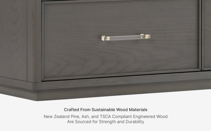 Gray wooden cabinet with a handle on a white background, featuring text about sustainable wood materials.