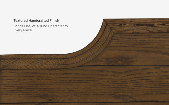 Close-up of a wooden surface with a textured handcrafted finish on a white background.