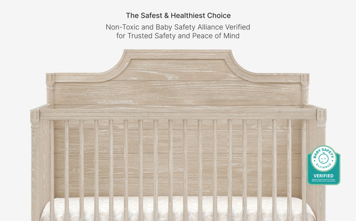 Wooden crib with safety certification logo on a white background