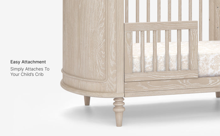 Wooden crib with a mattress on a white background
