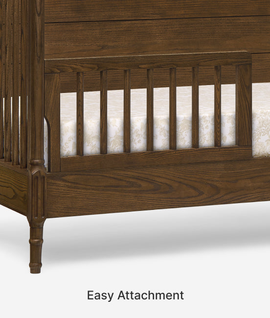 Wooden crib with clear panels and 'Easy Attachment' text on a white background