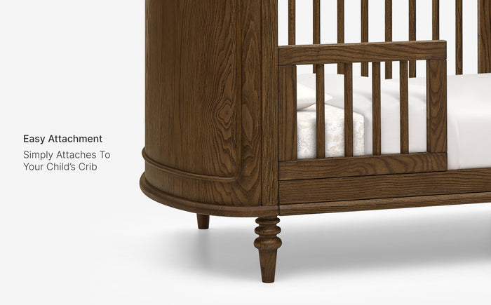 Wooden crib with easy attachment feature on a white background