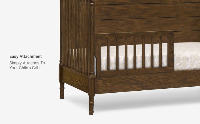 Wooden crib with mattress on a white background