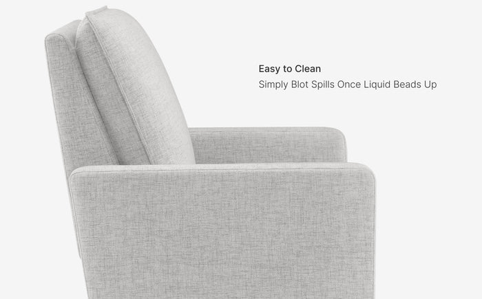 Gray upholstered chair with text indicating ease of cleaning.