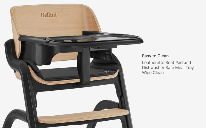 High chair with black tray and beige seat pad, featuring the brand 'Bellini'.