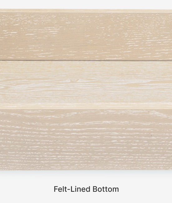 Close-up of a wooden surface with a felt-lined bottom label