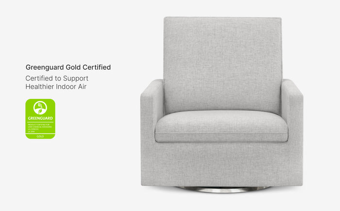Gray armchair with Greenguard Gold certification label on a white background