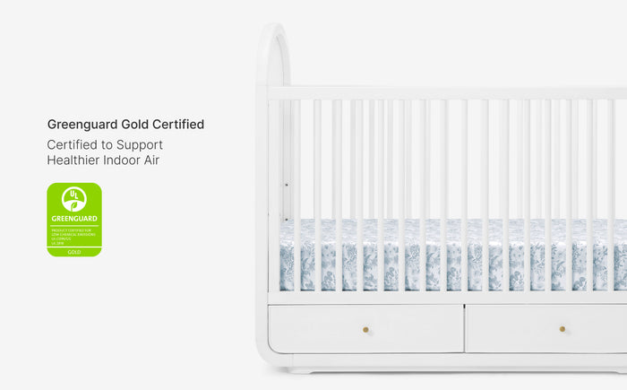 White air conditioner with Greenguard Gold certification label on a white background