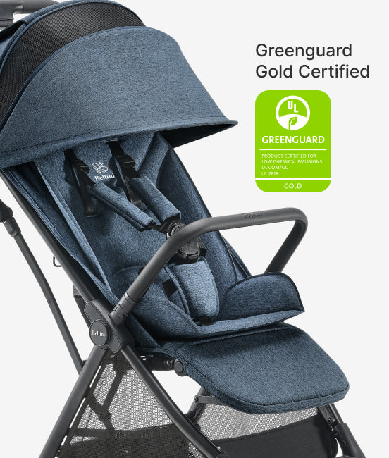 Blue stroller with Greenguard Gold certification label on a white background