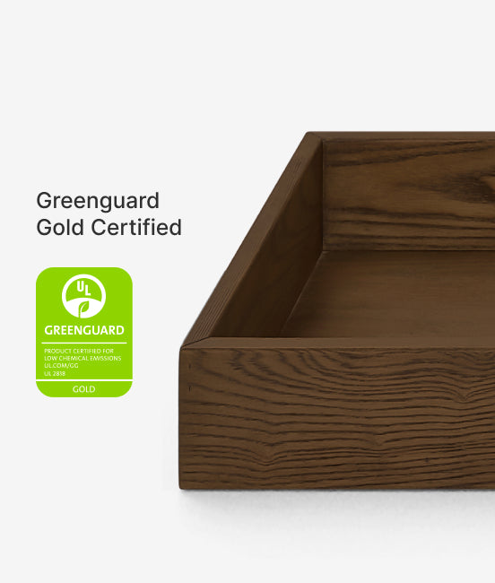 Wooden product with Greenguard Gold certification label on a white background