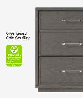 Gray file cabinet with Greenguard Gold certification label on a white background