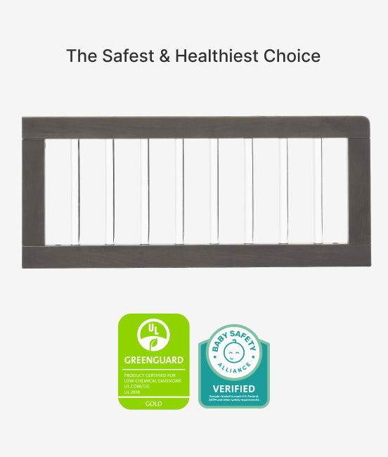 Baby safety gate with GreenGuard and Baby Safety Alliance certification logos on a white background.