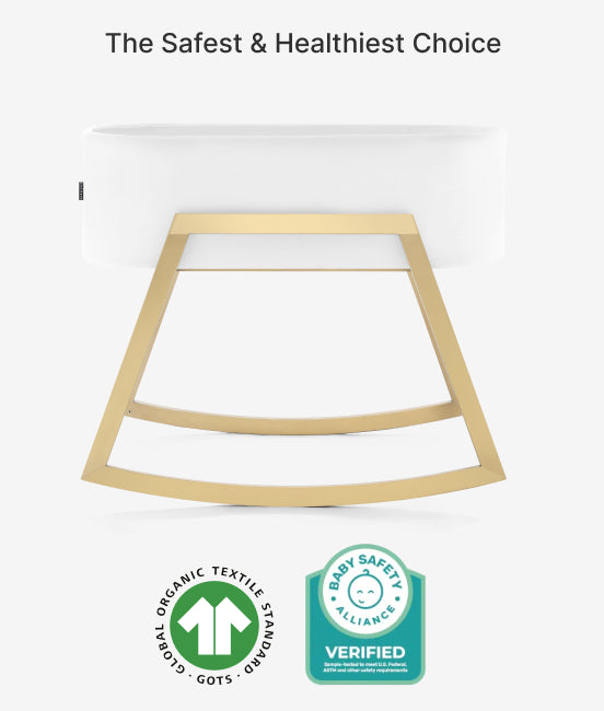 Wooden crib with safety certification logos on a white background