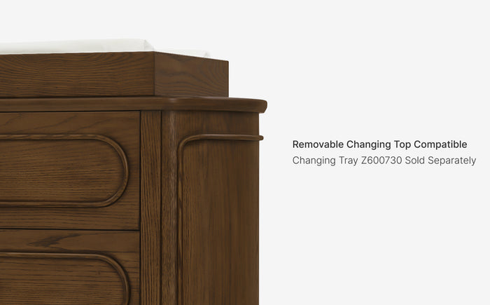 Wooden corner cabinet with text about a removable changing top and compatible tray.