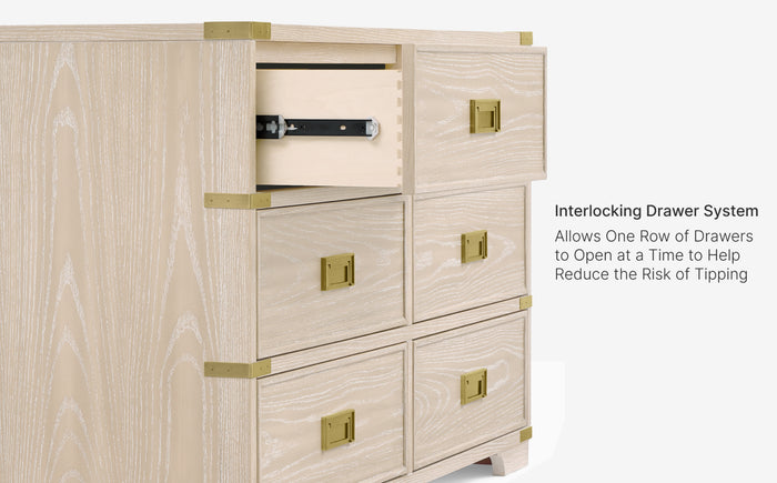 Wooden dresser with gold accents and interlocking drawer system on a white background