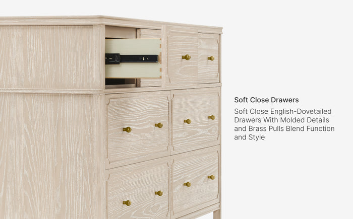 Wooden dresser with soft close drawers and brass pulls on a white background