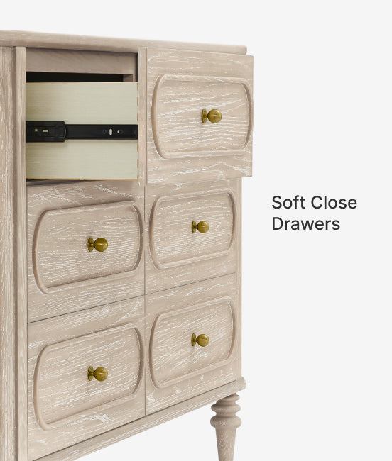 Beige dresser with gold knobs on a white background, highlighting soft close drawers.