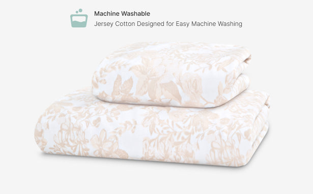 Folded jersey cotton fabric with floral pattern on a white background