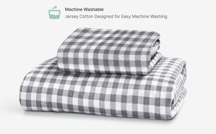 Gray and white checkered fabric on a white background with text about machine washability.