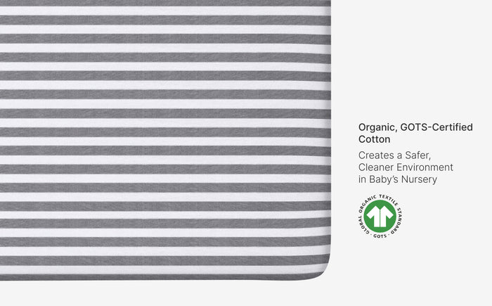 Striped fabric with GOTS certification label on a white background