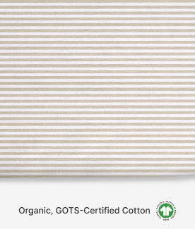 Striped fabric with organic, GOTS-Certified Cotton label on a white background