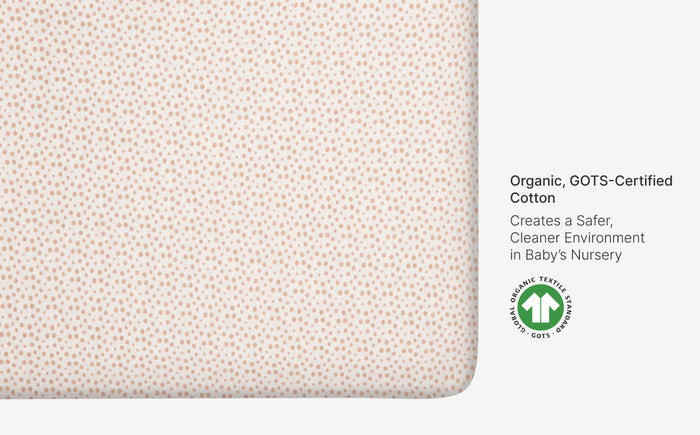Textured fabric with GOTS certification label on a white background