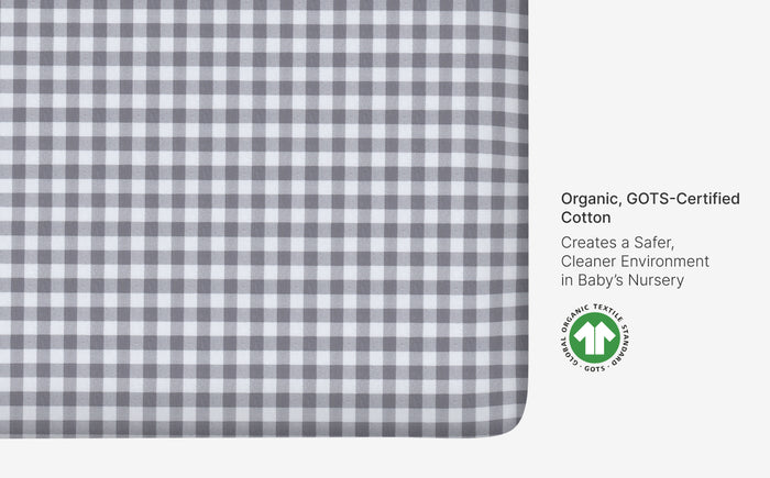 Gray and white checkered fabric with GOTS certification logo on a white background