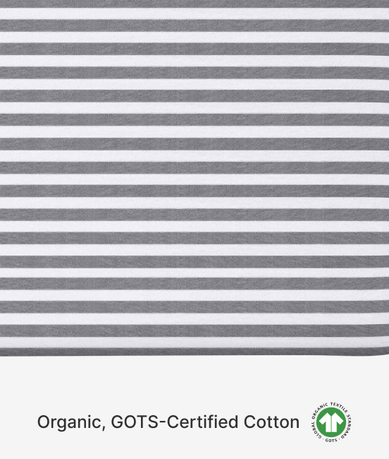 Striped fabric with gray and white stripes on a white background, featuring GOTS certification logo.