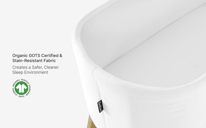 White mattress with GOTS certification label on a white background