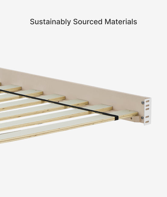 Wooden bed frame with sustainably sourced materials label on a white background
