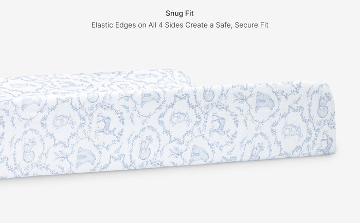 Fitted sheet with a subtle pattern on a white background