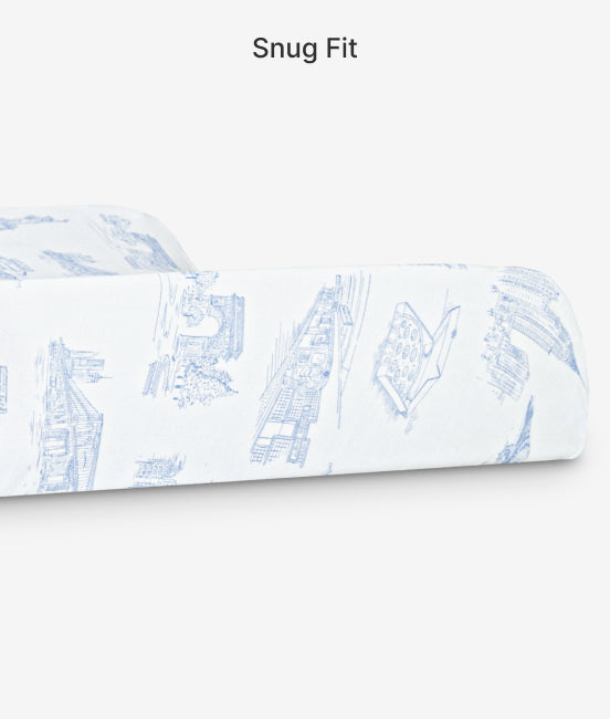 White fitted sheet with blue geometric pattern on a white background