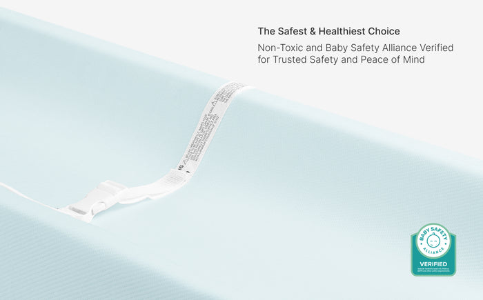 White baby safety strap on a light blue background with text about safety and alliance verification.