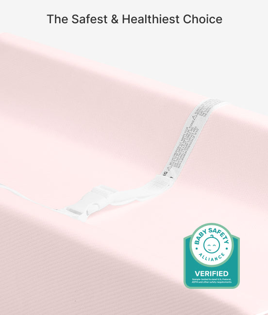 Breastfeeding bra with Baby Safety Alliance verified label on a pink background