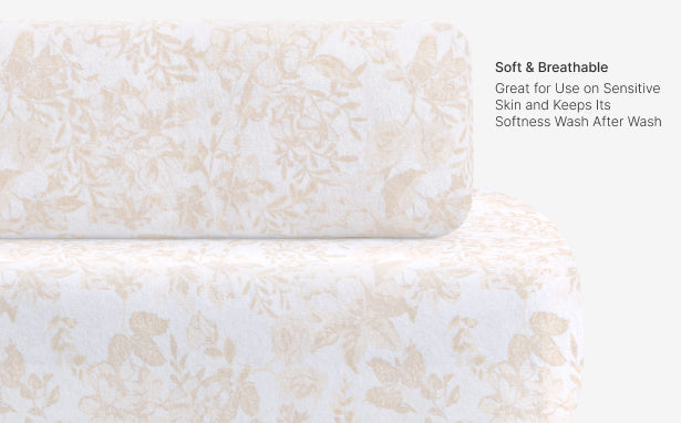White and beige patterned fabric with text on softness and breathability.