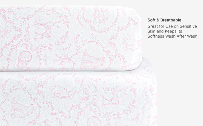 White fabric with red pattern and text about softness and breathability.