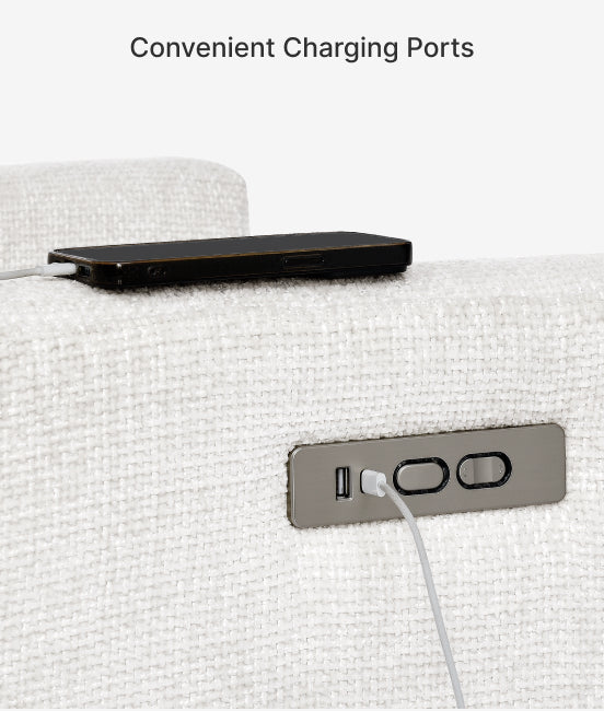 Phone charging on a white surface with a charging port visible.