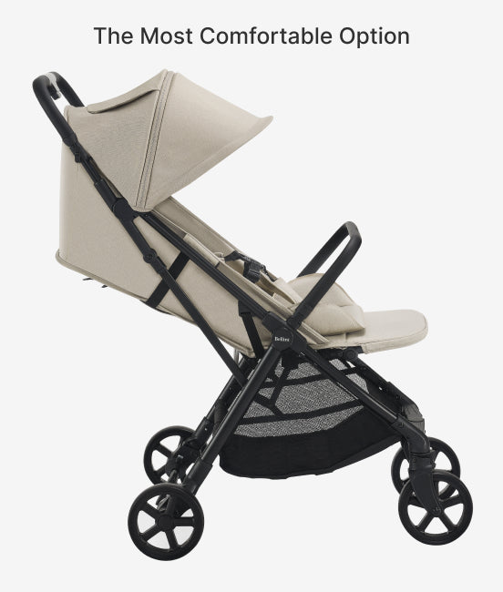 Beige stroller with black frame and wheels on a white background