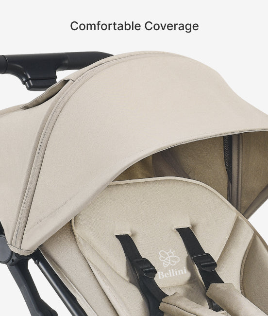 Beige baby stroller with canopy and Bellini branding on a white background