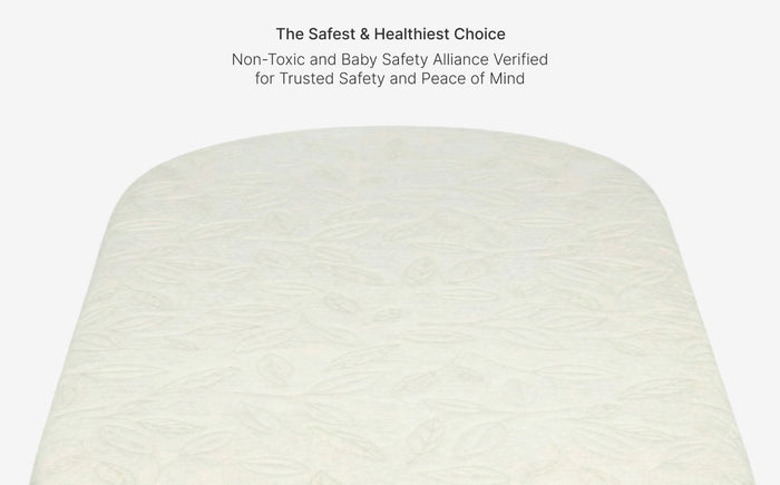 White baby bottle with text about safety and health on a white background