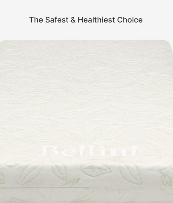 White crib sheet with subtle pattern on a white background, labeled 'The Safest & Healthiest Choice'.