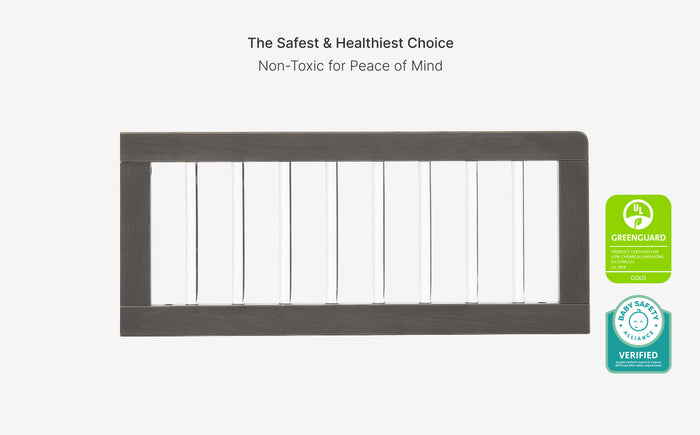 Baby safety gate with green certification logo on a white background